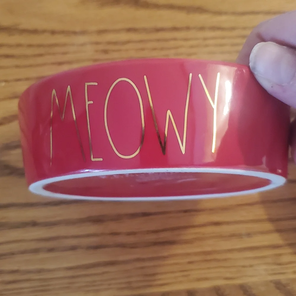 Rae Dunn meowy and bright red pet dishes